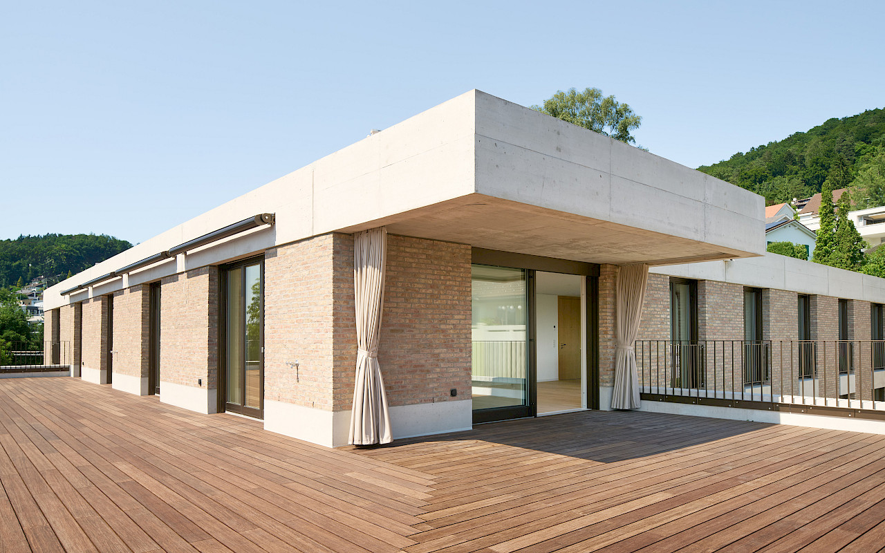 Neubau Mehrfamilienhaus an prominenter Lage im Dorfkern von Geroldswil.